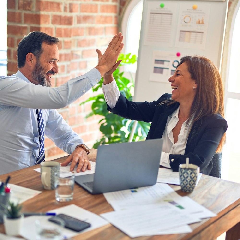 Two Tap Next strategists working through a funnel plan with a customer